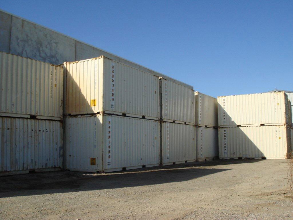 Stacked White Metal Shipping Containers - Home & Office Removals in Mackay, QLD